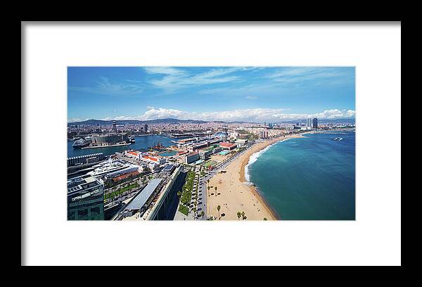 Barcelona Framed Print featuring the photograph Barcelona beach and barcelona city #4 by Anek Suwannaphoom