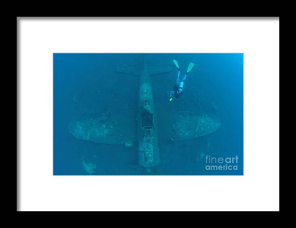 Kimbe Bay Framed Print featuring the photograph Diver Explores The Wreck #6 by Steve Jones