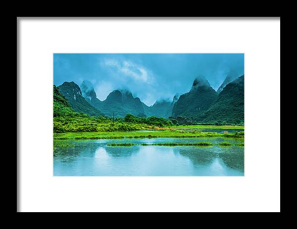 Karst Framed Print featuring the photograph Karst rural scenery in raining #6 by Carl Ning