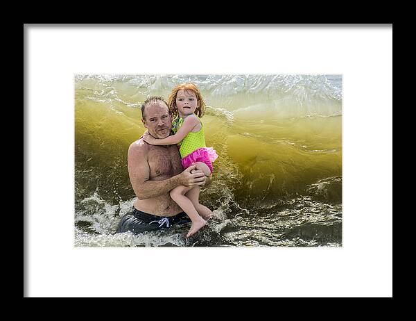 Beach Framed Print featuring the photograph A Father, A Daughter, and A Big Wave by WAZgriffin Digital