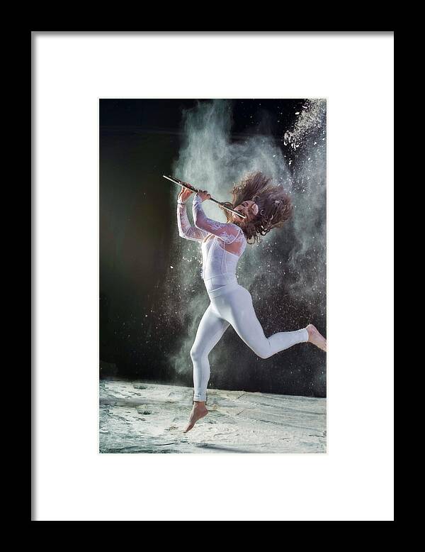 Nina Assimakopoulos Framed Print featuring the photograph A flair for the flute by Dan Friend