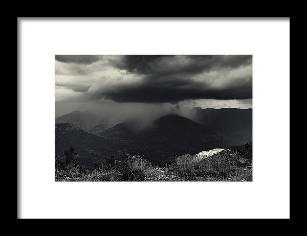 Mountains Framed Print featuring the photograph A Little Shower by Fabien Bravin