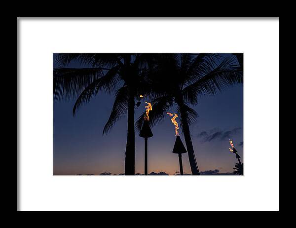 Tiki Torches Framed Print featuring the photograph A Purple Night for a Beach Party by Georgia Mizuleva