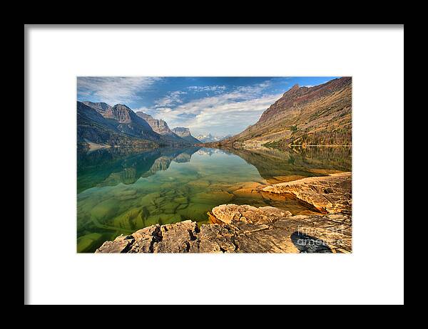 St Mary Lake Framed Print featuring the photograph A Rocky Bottom To Towering Peaks by Adam Jewell