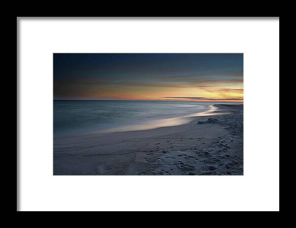 Sunset Framed Print featuring the photograph A Sandy Shoreline at Sunset by Renee Hardison