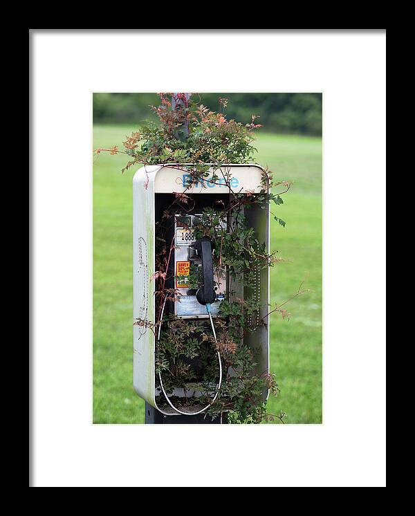 Pay Phone Framed Print featuring the photograph A Sign of the Times by Jerry Connally