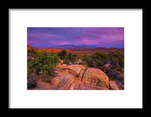 Arches National Park Framed Print featuring the photograph A Sunset Over Arches by John De Bord