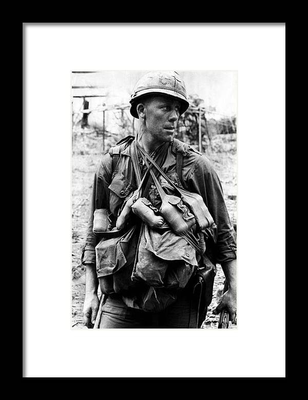 1960s Candids Framed Print featuring the photograph A U.s. Soldier With The U.s. 1st by Everett