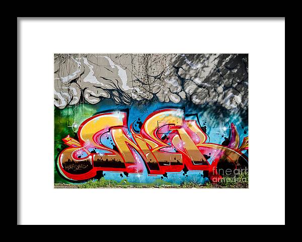 Abstract Framed Print featuring the painting Abstract Graffiti fragment on the textured wall by Yurix Sardinelly