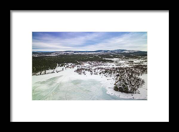 Dji Framed Print featuring the photograph Aerial of Frozen Lake Inari Finland by Adam Rainoff