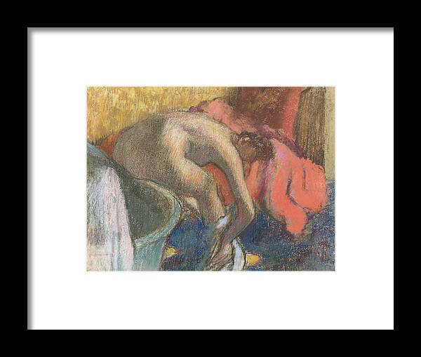 Degas Framed Print featuring the pastel After the bath, woman drying her leg  The red robe by Edgar Degas