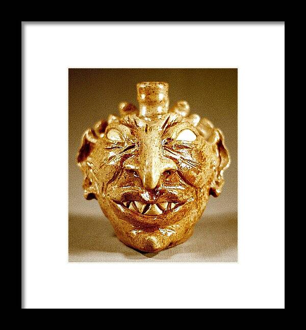 Wood Fired Stoneware Framed Print featuring the ceramic art Ahriman as Face Jug by Stephen Hawks