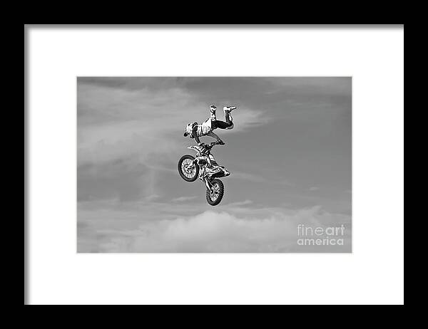 Motorsport Framed Print featuring the photograph Airborne motorcycle by Yurix Sardinelly