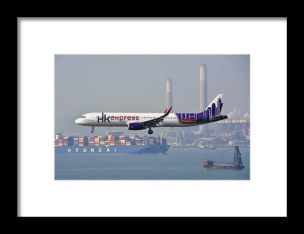 Airbus A321 Framed Print featuring the photograph Airbus A321 by Mariel Mcmeeking
