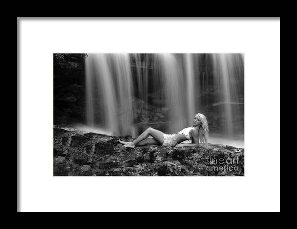 Waterfall Framed Print featuring the photograph Ally laying down in front of waterfall by Dan Friend