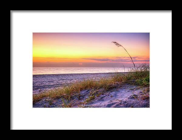 Clouds Framed Print featuring the photograph Alone at Dawn by Debra and Dave Vanderlaan