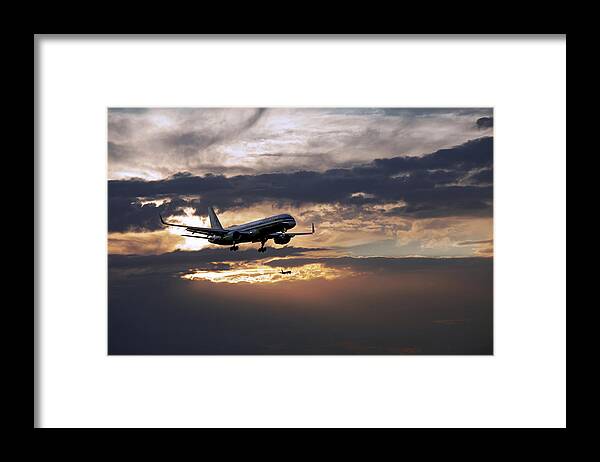 Aa Aircraft Landing Framed Print featuring the photograph American aircraft landing at the twilight. Miami. FL. USA by Juan Carlos Ferro Duque