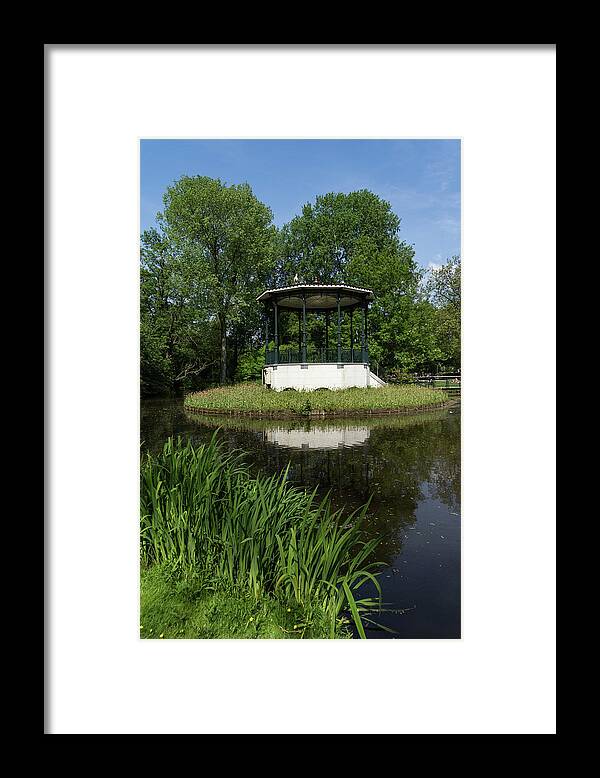Georgia Mizuleva Framed Print featuring the photograph Amsterdam Vondelpark - Elegant Garden Gazebo with a Heron on the Roof by Georgia Mizuleva