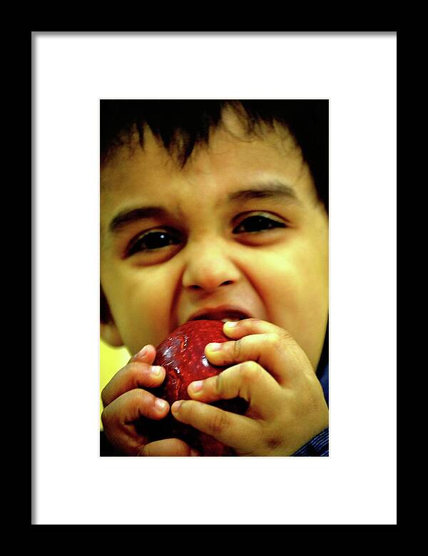 An Apple A Day Keeps The Doctor Away Framed Print featuring the photograph An Apple A Day Keeps The Doctor Away by Anand Swaroop Manchiraju