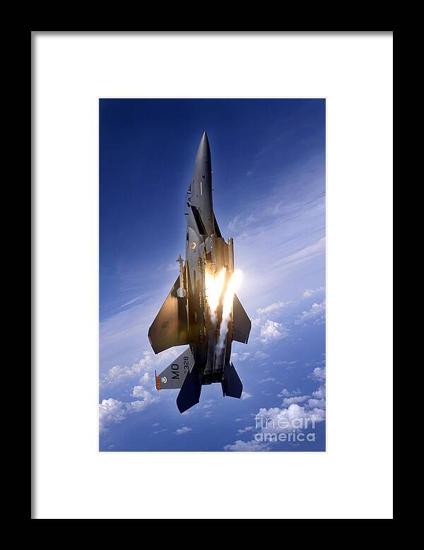 Vertical Framed Print featuring the photograph An F-15e Strike Eagle Pops Flares by Stocktrek Images