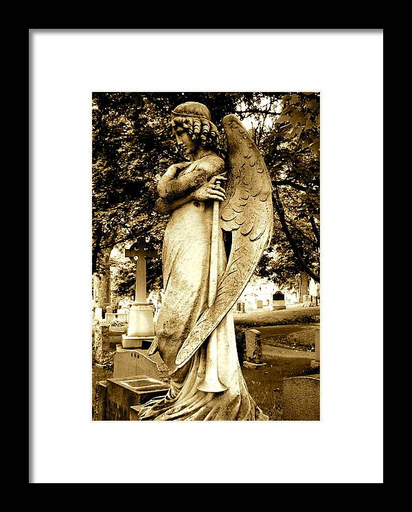 Angel Statue Framed Print featuring the photograph Angel With a Trumpet. by Loretta Fasan