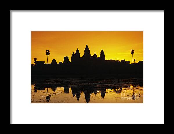 Ancient Framed Print featuring the photograph Angkor Wat silhouette of temple by Gloria and Richard Maschmeyer - Printscapes