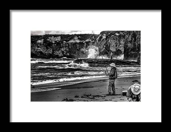  Framed Print featuring the photograph Angler on the Beach by Patrick Boening