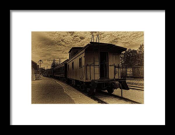 Sepia Framed Print featuring the photograph Antique Iron Range Caboose by Dale Kauzlaric