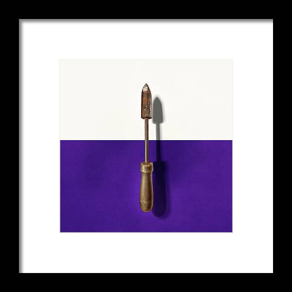 Antique Framed Print featuring the photograph Antique Soldering Iron on Color Paper by YoPedro