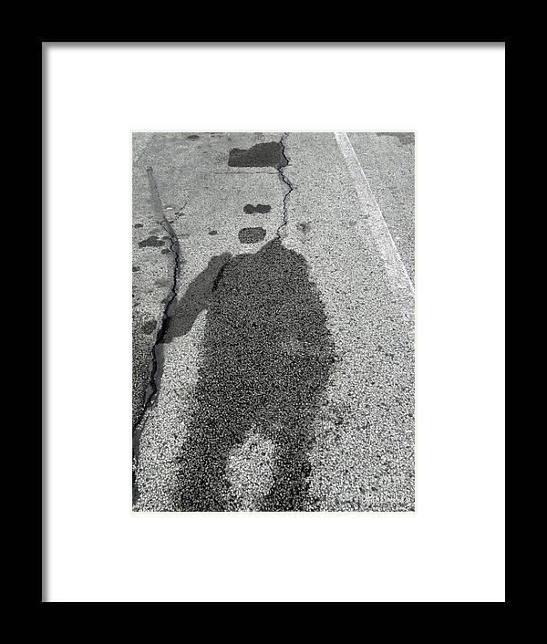 Abstract Framed Print featuring the photograph Asphalt Man by Lyric Lucas
