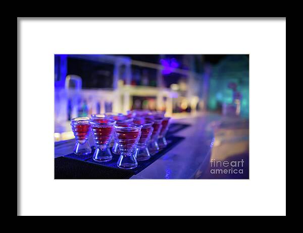 Magic Ice Bar Framed Print featuring the photograph At the Magic Ice Bar by Eva Lechner