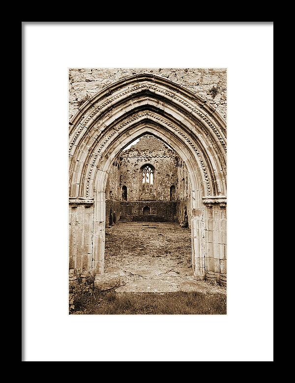 Athassel Framed Print featuring the photograph Athassel Priory Tipperary Ireland Medieval Ruins Layered Arched Doorway into Great Hall Sepia by Shawn O'Brien