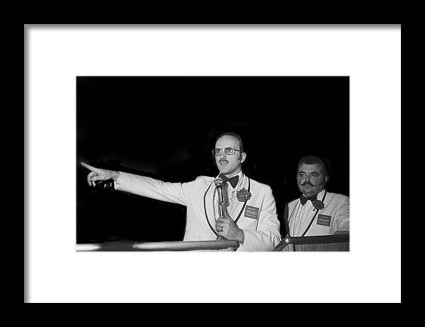 Auctioneer Dennis Kruse Gesturing Leo Gephart Scottsdale Arizona Framed Print featuring the photograph Auctioneer Dennis Kruse gesturing and Leo Gephart Scottsdale Arizona 1973-2016 by David Lee Guss