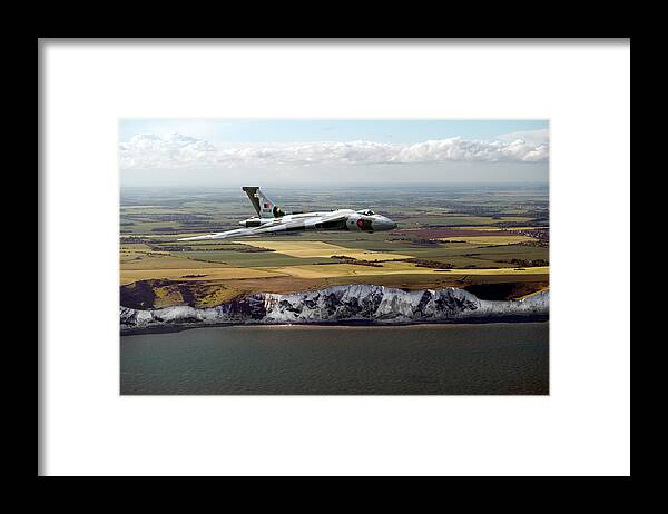 Avro Vulcan Framed Print featuring the photograph Avro Vulcan over the white cliffs of Dover by Gary Eason