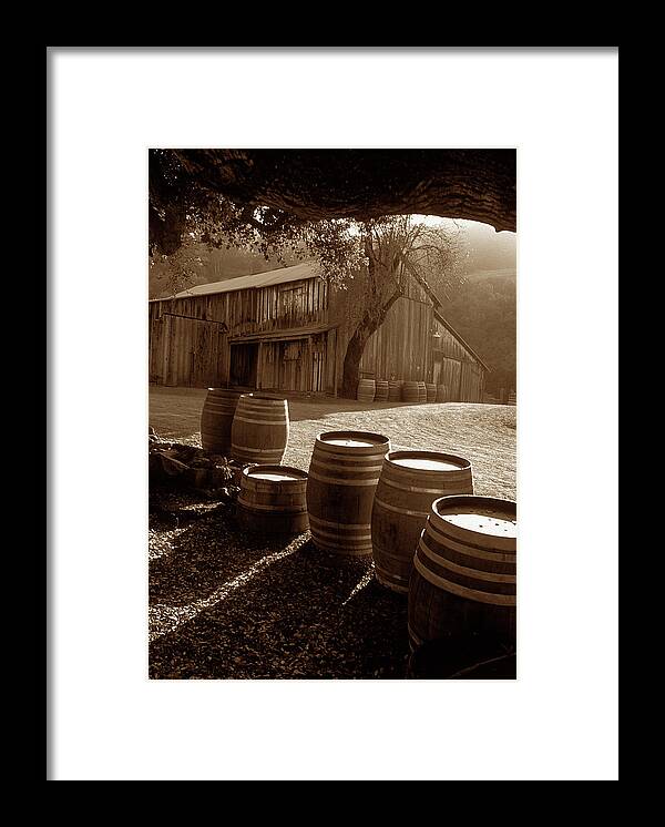 Old Barns Framed Print featuring the photograph Barn and Wine Barrels 2 by Kathy Yates