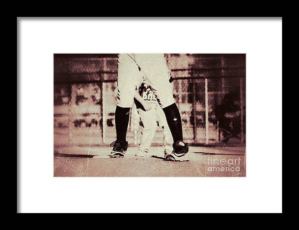 Pitcher With Holes In His Socks Framed Print featuring the photograph Battle on the Mound by Leah McPhail
