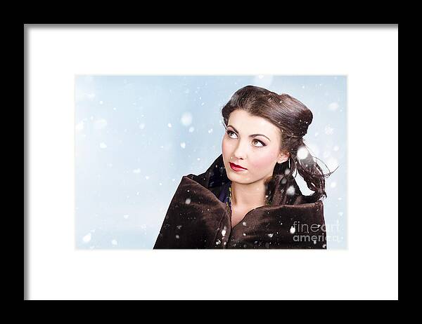 Winter Framed Print featuring the photograph Beautiful brunette woman freezing in outdoor forest by Jorgo Photography