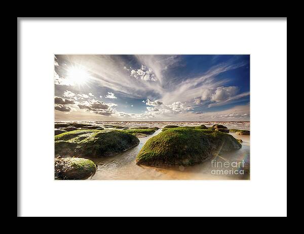 Sand Framed Print featuring the photograph Beautiful seaweed rock outcrops on Norfolk coast by Simon Bratt