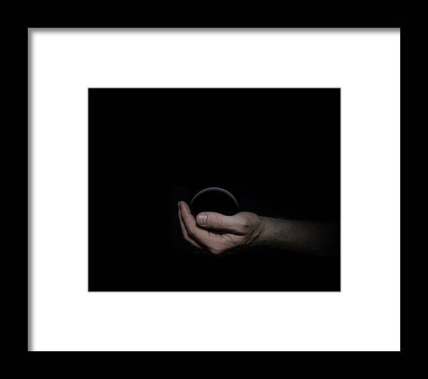 Black Framed Print featuring the digital art Black Sphere in Hand by Pelo Blanco Photo