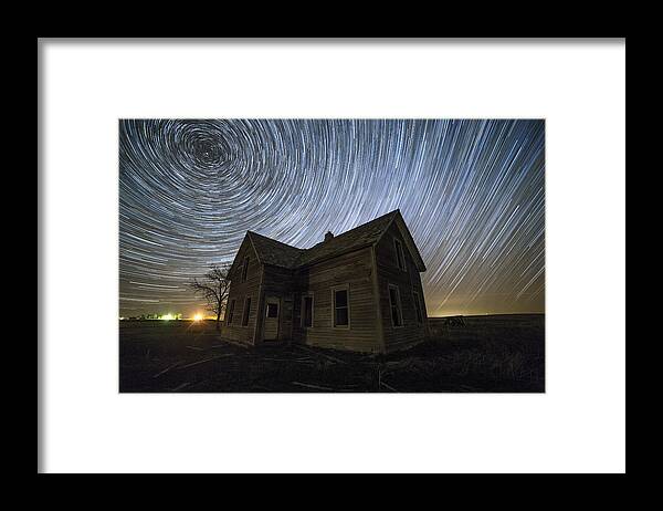 Star Tails Framed Print featuring the photograph Blackhole Sun by Aaron J Groen