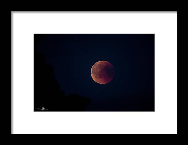 Blood Moon Framed Print featuring the photograph Blood Moon by Torbjorn Swenelius