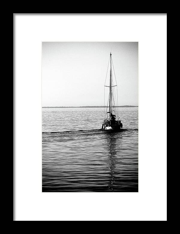 Seascape Framed Print featuring the photograph Boat at sea by Aaron Fait