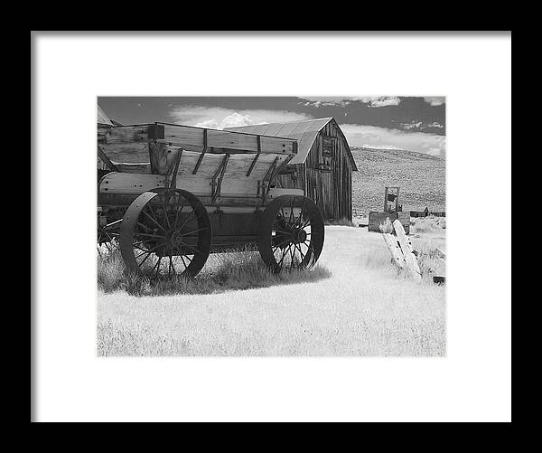 Old Framed Print featuring the photograph Bodie CA - Praise the Lord and pass the ammunition by Alexandra Till