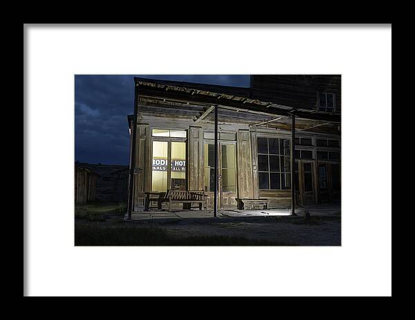 Abandoned Framed Print featuring the photograph Bodie Hotel illuminated at night by Karen Foley