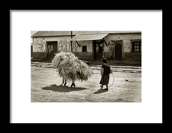 Child Framed Print featuring the photograph Bolivian Child Working by Amarildo Correa