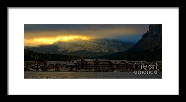 Many Glacier Hotel Framed Print featuring the photograph Breaking Storm Clouds Over Many Glacier by Adam Jewell