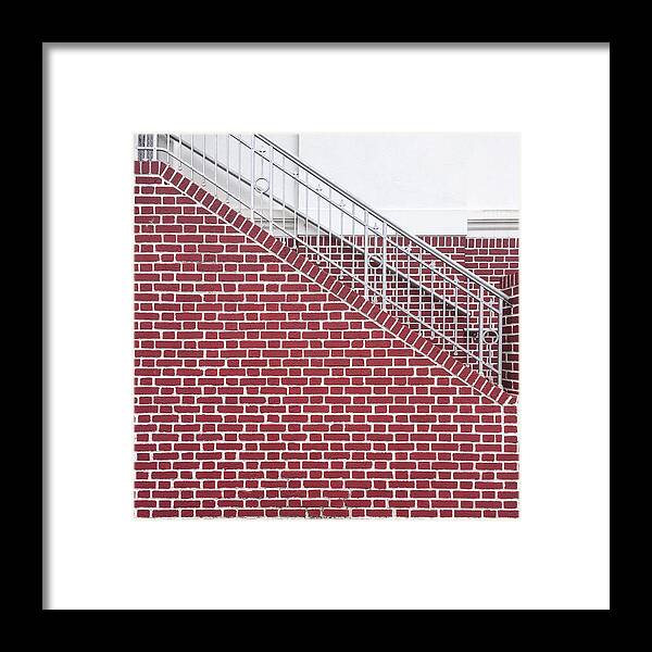 Wall Framed Print featuring the photograph Brick wall and stairs by Erik Burg