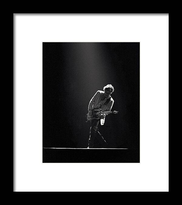 Bruce Springsteen Framed Print featuring the photograph Bruce Springsteen in the Spotlight by Mike Norton