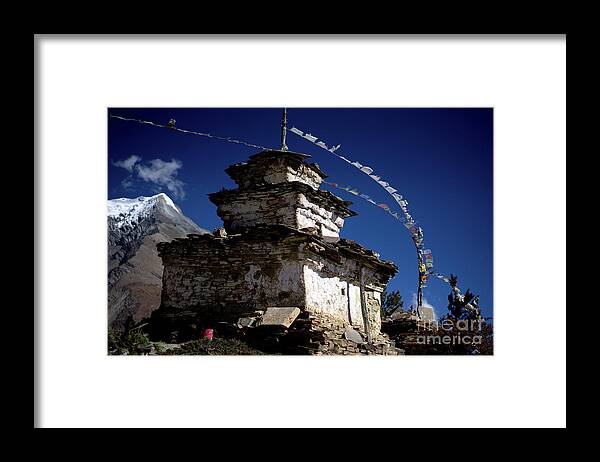 Nepal Framed Print featuring the photograph Buddhist gompa and prayer flags in the Himalaya mountains, Nepal by Raimond Klavins
