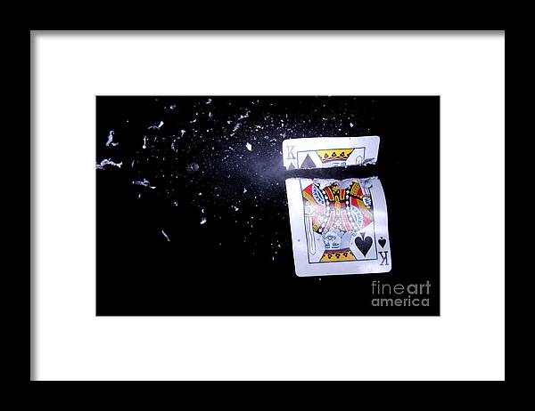 Card Framed Print featuring the photograph Bullet Hitting A Playing Card by Ted Kinsman